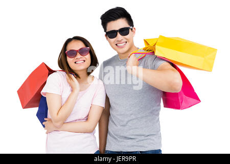 Junges Paar Holding Shopping bags Stockfoto