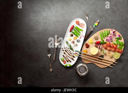 Maler Essen Würze Palette mit bunten Kräutern Gewürzen und frischen Zutaten Stockfoto