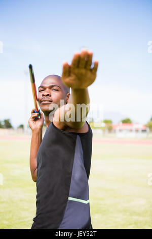 Sportler zu einem Speerwurf Stockfoto