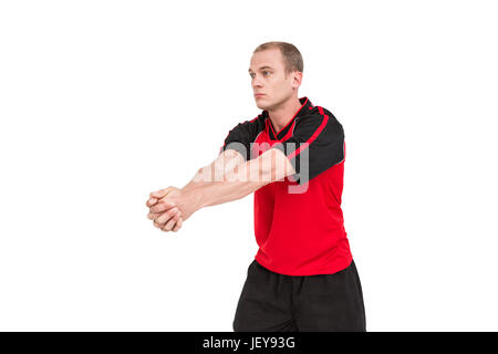 Sportler posieren beim Volleyball spielen Stockfoto