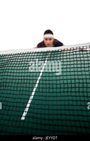 Tennis-Spieler hinter net Stockfoto