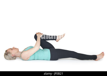 Yoga Frau grüne Position 36 Stockfoto