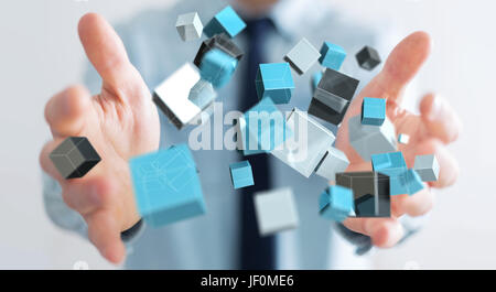 Geschäftsmann auf unscharfen Hintergrund halten, schwimmende blau glänzend Cube 3D Rendern im Netzwerk Stockfoto