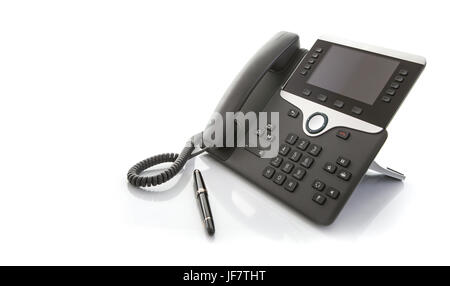 Moderne Business Office IP-Telefon mit Stift auf weißem Hintergrund Stockfoto