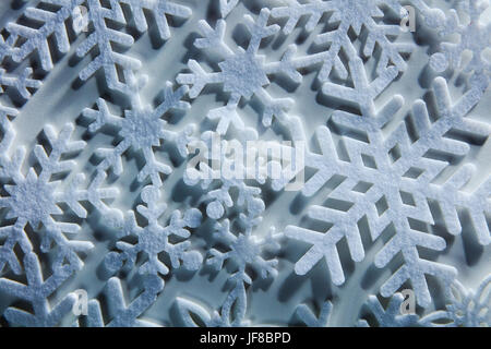 Schneeflocken auf Hintergrund. Stockfoto