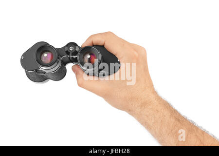 Hand mit dem Fernglas Stockfoto