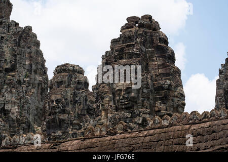 Stein geschnitzte Gesichter bei Bayon Tempel, Kambodscha, Asien Stockfoto