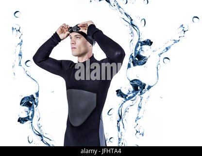 Das zusammengesetzte Bild der Schwimmer in einen Neoprenanzug tragen Schwimmbrille Stockfoto