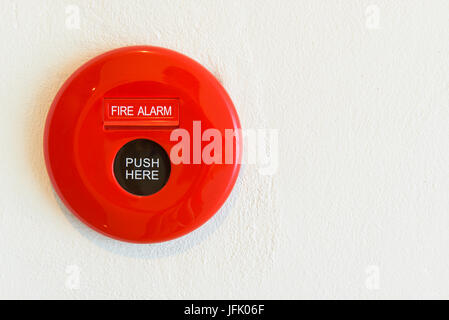 Red Fire Alarm an einer Wand Stockfoto