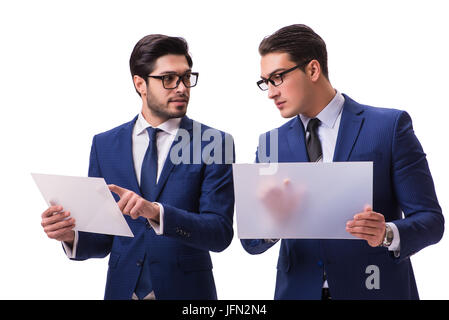 Die beiden Geschäftsleute mit virtuellen Tabletten isoliert auf weißem Stockfoto