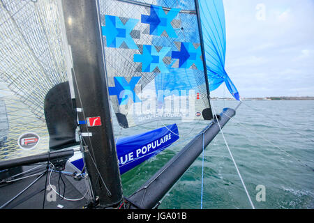 Armel Le Cléac'h und Kevin Escoffier von Banque Populaire Sailing Team und das fliegende Phantom. Das fliegende Phantom ist eine neue Generation von Folierung Stockfoto