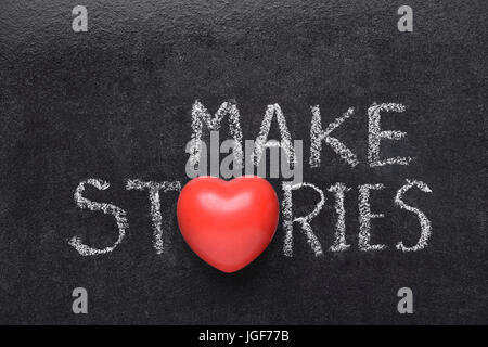 machen Sie Geschichten Ausdruck handschriftlich auf Tafel mit Herzsymbol statt O Stockfoto