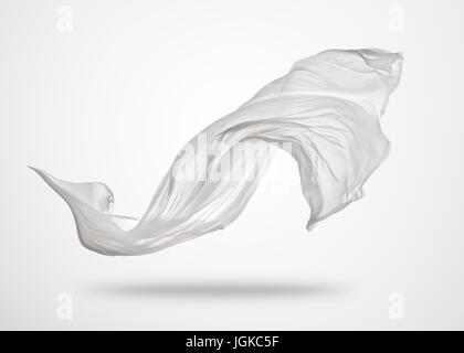 Glattes eleganten transparentes weißes Tuch getrennt auf grauem Hintergrund. Textur des Fliegens Stoff. Stockfoto