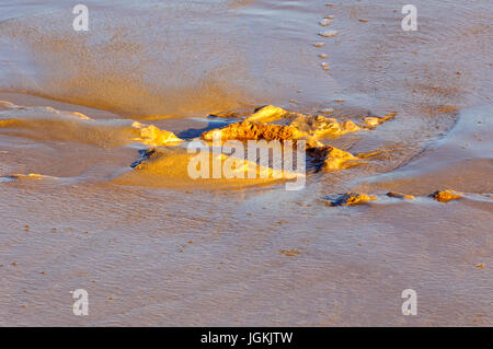 Kleinen Teich hinterließ bei Ebbe Stockfoto