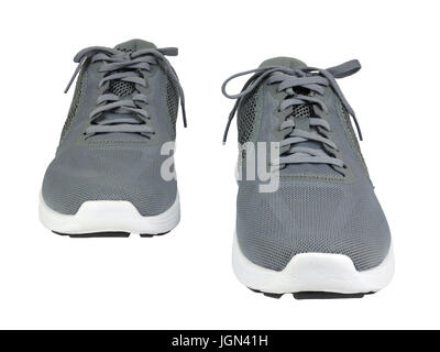 Graue Sneaker auf weißem Hintergrund Stockfoto