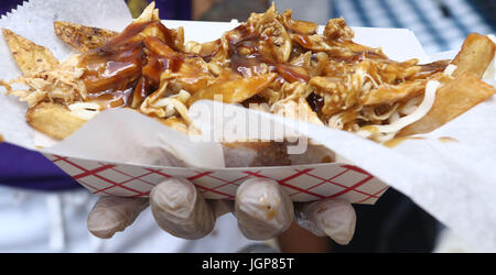 Poutine für Meuterei auf der Feier Stockfoto