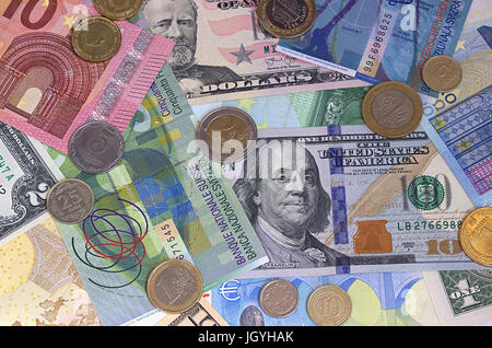 Abstrakte Dollar Euro Schweizer Franken und Münzen Hintergrund Stockfoto