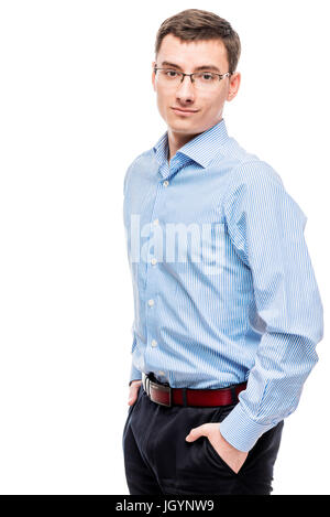 25 Jahre alte Unternehmer im blauen Hemd auf weißem Hintergrund Stockfoto