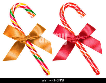 Gestreifte Weihnachten Zuckerstangen (rot / multicolor) mit Bogen, isoliert über weiß, Clipping-Pfad Stockfoto