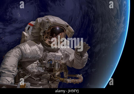 Astronauten in den Weltraum. Nebel im Hintergrund. Elemente des Bildes von der NASA eingerichtet. Stockfoto