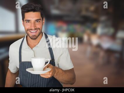 Digitalen Verbund aus Cafe Besitzer austeilen Tasse Kaffee gegen verschwommen café Stockfoto