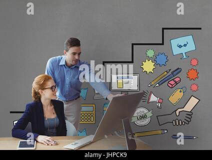 Digitalen Verbund von Geschäftsleuten an einem Schreibtisch sah einen Computer vor grauem Hintergrund mit Grafik Stockfoto