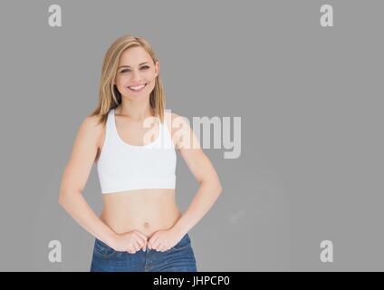 Digital Composite Porträt Fit Frau mit grauem Hintergrund Stockfoto