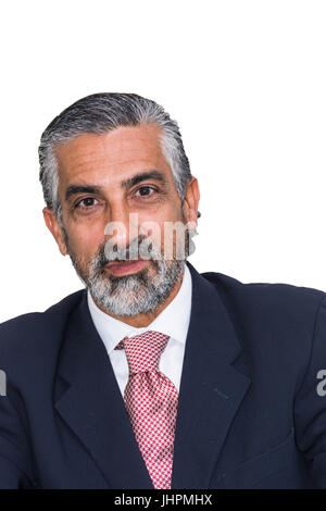 Gut aussehender Geschäftsmann in seinem Studio, in Anzügen, bärtig, bunt. Stockfoto