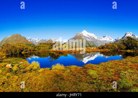 "Key Summit mit Reflexion des Mt. Christina, Fjord Nationalpark, Welt-Natur-Erbe South West New Zealand, Westküste, Insel Süden neue Z Stockfoto