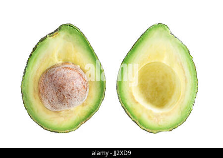 Zwei Scheiben Avocado. Eine Scheibe mit Kern. Stockfoto