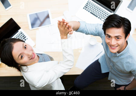 Geschäft Leute Donnerschlag zu feiern Stockfoto