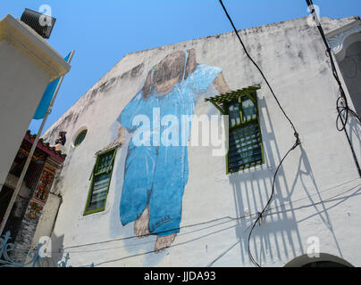 Georgetown, Malaysia - 10. März 2016. Backsteinhäuser mit Dekorationen an der Wand in George Town, Malaysia. Eine der ältesten Städte in Malaysia, George Stockfoto