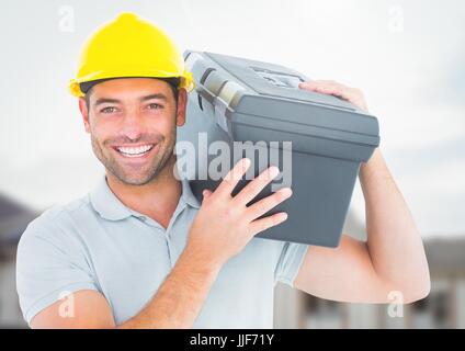 Digitalen Verbund von Bauarbeiter mit Werkzeug box vor Baustelle Stockfoto
