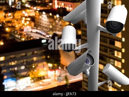 Digital Composite CCTV Stick beherrschte die Stadt in der Nacht mit unscharfen Stadt Stockfoto