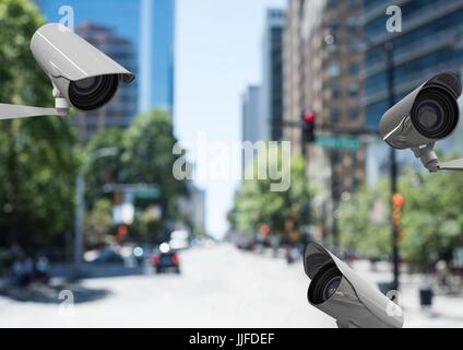 Digitalen Verbund aus 3 CCTV kontrolliert die Straße in eine verschwommene Straße im Laufe des Tages Stockfoto