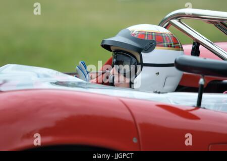 Sir Jackie Stewart 1965 Lola Chevrolet T70 Spyder fahren Stockfoto