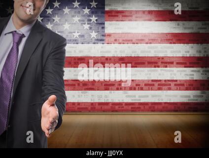 Business-Mann schüttelte seine Hand gegen amerikanische Flagge Stockfoto