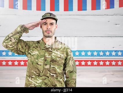 Soldat mit Hand am Kopf vor amerikanischen Hintergrund Stockfoto