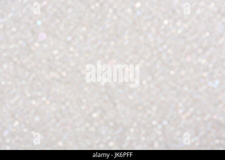 Weißer Bokeh Lichter Hintergrund. Stockfoto