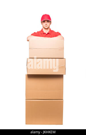 Lieferung Mann, der Haufen aus Pappe hält Boxen vorne mit Textfreiraum Stockfoto