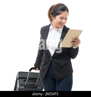 Geschäftsfrau Hand Holding Tablet beim Gepäck Stockfoto