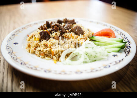 Usbekischer Pilaw mit Rindfleisch Stockfoto