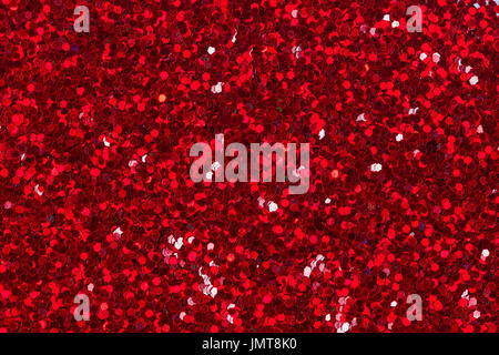 Rote Glitzer-Textur für den Hintergrund. Stockfoto