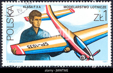 Polen - 1981: Porto Stempel gedruckt in Polen zeigt das Flugzeug modellieren. Stempel von polnischen Post ca. 1981 gedruckt. Stockfoto