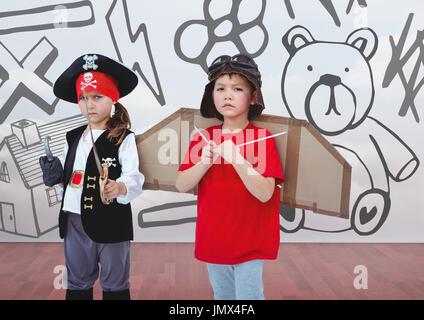 Digital Composite Pirate Girl und Pilot jungen im Zimmer mit Kindern zeichnen von Grafiken Stockfoto