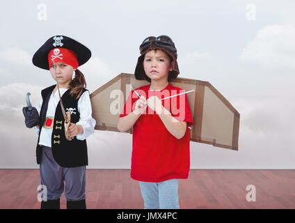 Digital Composite Pirate Girl und Pilot jungen im Zimmer Stockfoto