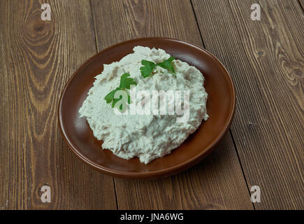 Geflügel-Potpourri - Coconut Chicken.Chicken gebacken wird in Kokosmilch mariniert. Stockfoto