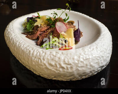 Verschlafene Lamm terraic in Fleisch-Sauce und Shiitake-Pilzen Stockfoto