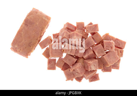 Ansicht von oben aus der Dose Schinken, die mit einem großen Stück isoliert auf weißem Hintergrund in Stücke geschnitten worden. Stockfoto