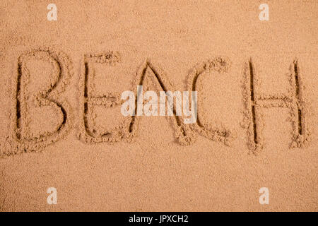 Geschrieben in weichen nassen Sand am Strand Beach Stockfoto